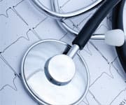 Closeup of a stetoscope and ecg