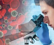 man using microscope