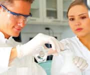 Woman with tissue having flu or allergy