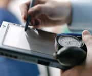 Doctor using electronic notepad