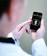 Doctor using medical cell phone application