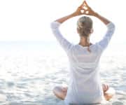 Woman stretching on beach