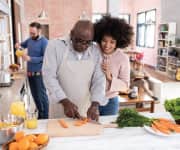 Man chopping vegetables