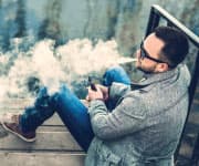 Man smoking E-Cigarette