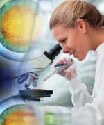 Scientist looking through Microscope