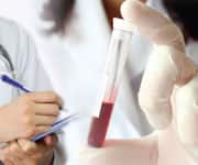 A person holding a test tube