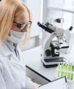 Scientist reading papers