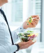 Man eating a salad