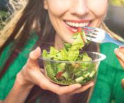Woman eating a salad