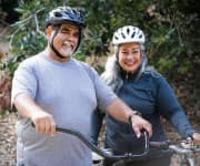 Man and woman ridin bikes
