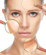 Womans face with magnifying glasses