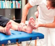 Man having feet checked