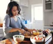 Woman cutting vegetables