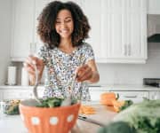 Woman serving salad