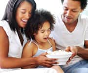 Family sharing popcorn