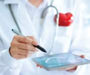 Doctor holding a tablet computer