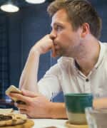 Man sitting in a thinking pose