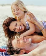 Family playing in the sun