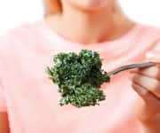 Woman holding kale