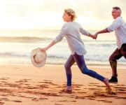 Couple running on the beach