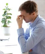 man suffering from dry eyes