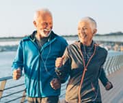 senior couple out for a jog
