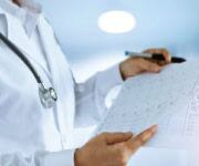 Doctor reading a chart