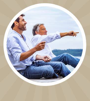 Two men outside and happy in circle