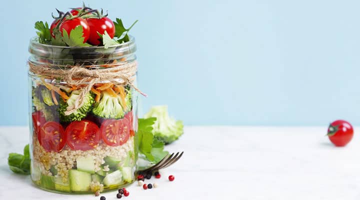 Mason jar of clean vegetables suggested by Suzanne Somers