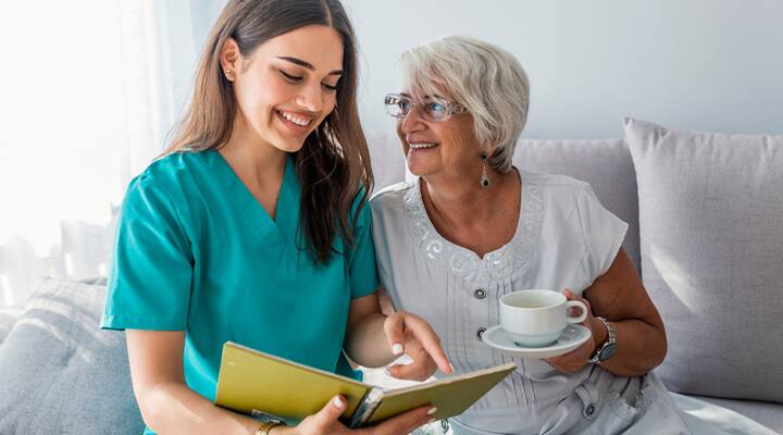 Nurse caring for Alzheimer's patient using Leeza Gibbons Research