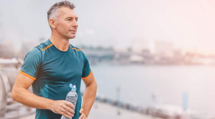 Man running having better energy through balanced hormone levels