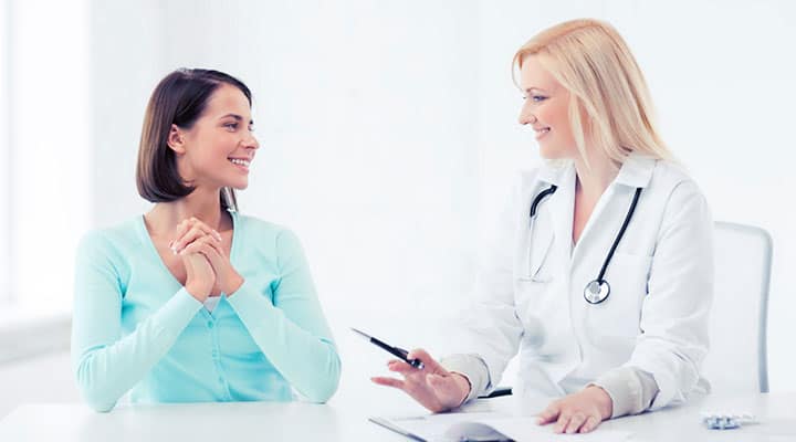 Doctor talking with patient about supplements on market