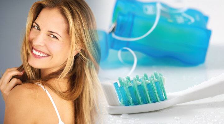 Toothbrush and floss being used against gum disease with oral probiotics