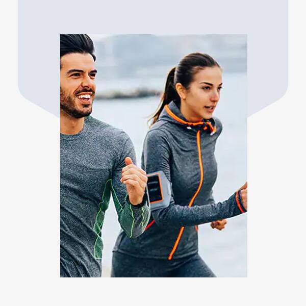 Healthy couple running in the morning