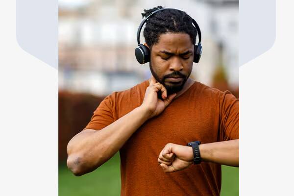 man checking his heart rate