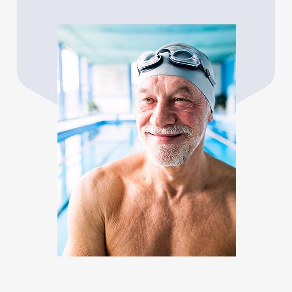 Healthy older man ready to swim