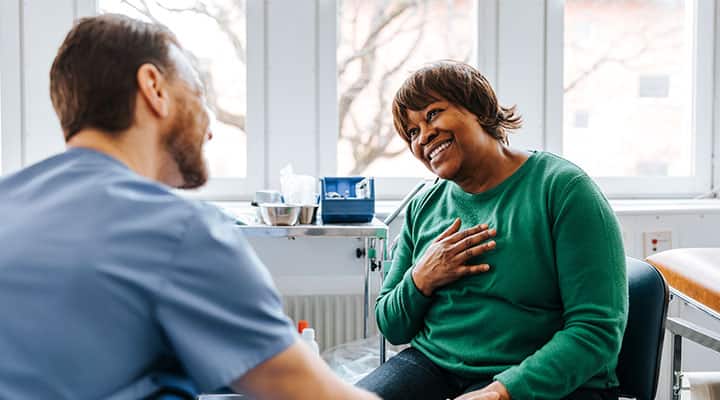 Woman speaking with healthcare provider