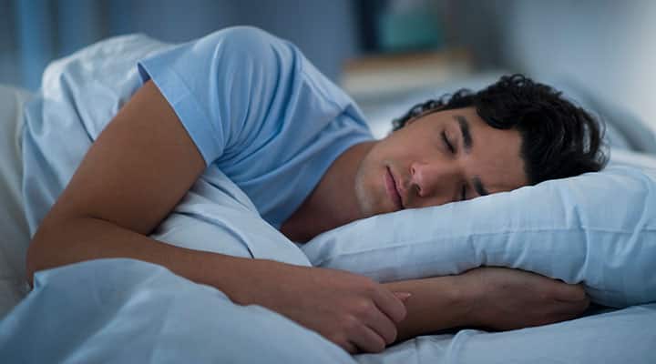Man sleeping to support immune health