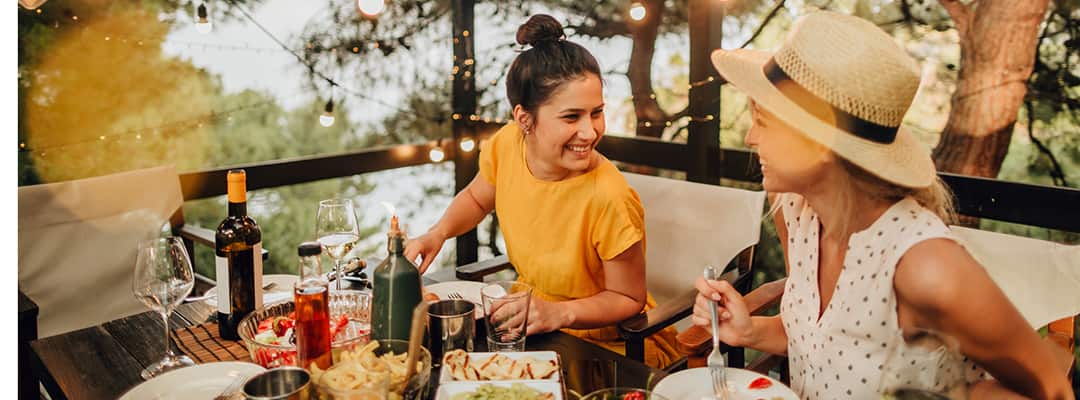 Sisters enjoy Mediterranean diet meal outdoors