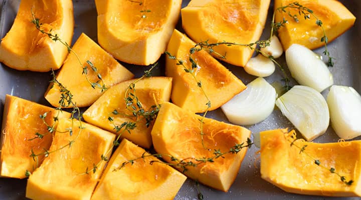 The pumpkin is cooked with garlic, onion and fresh thyme in this recipe