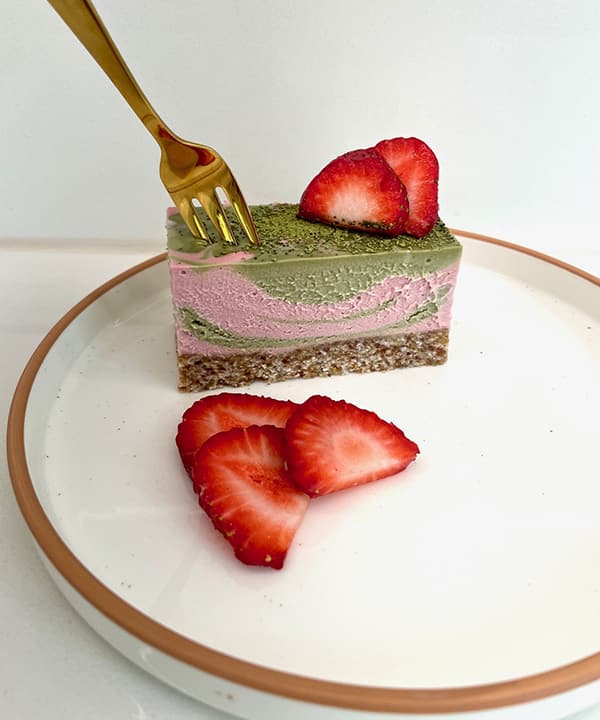 The strawberry cream is layered on top of the matcha mix in this recipe