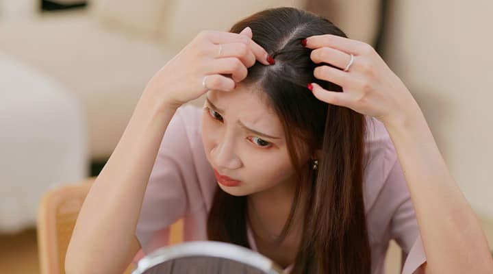 Hormonal reasons and genetics can impact healthy hair in women
