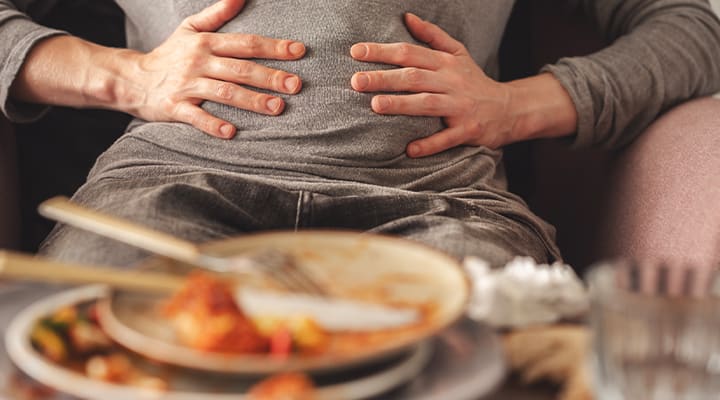 One cause of bloating is occasional constipation.