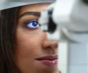 Woman having her eye examined