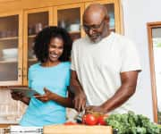 Older couple preparing dinner together